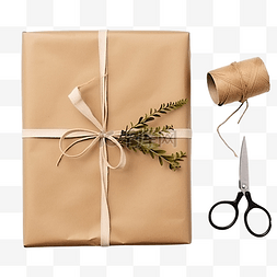 剪刀和图片_用牛皮纸包裹的圣诞礼物，上面有