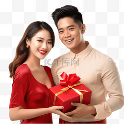 人在装饰圣诞树图片_快乐美丽的年轻越南夫妇在平安夜
