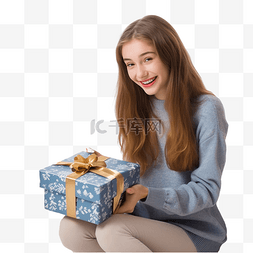 红色礼盒打开图片_圣诞装饰房间里的少女打开礼盒