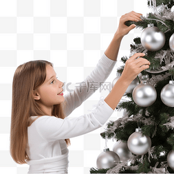 幸福生活图片_母亲和女儿在树上挂圣诞装饰品
