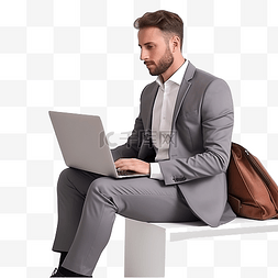 人坐在桌子前图片_穿着西装的男人与坐在笔记本电脑