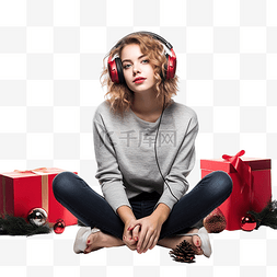 圣诞节假期里的女孩坐在地板上听