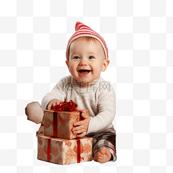 坐着的婴儿图片_有趣的婴儿，表面有礼品盒圣诞树