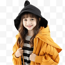 女孩的笑脸图片_秋季万圣节概念中一个穿着暖和衣