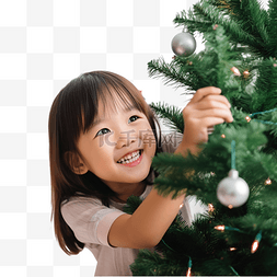 人民的名义图片_亚洲美女很高兴装饰家里的圣诞树