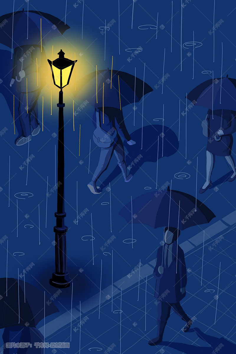 下雨夜晚路灯下的人