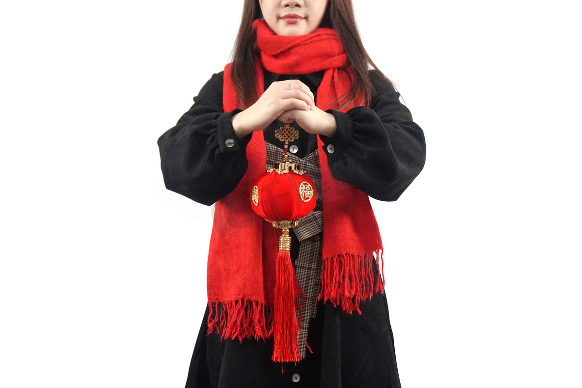 春节红色喜庆女性拜年手势摄影图图片