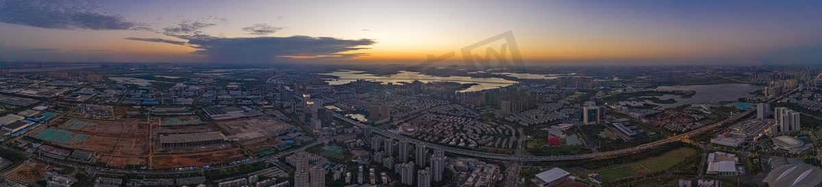 武汉城市天际线夕阳天空经开区航拍全景摄影图配图图片