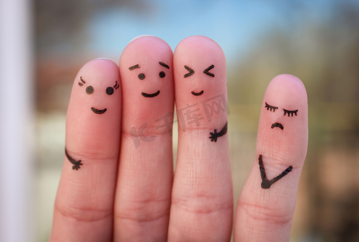 Fingers art of people. Concept of loneliness, allocation from crowd. 图片