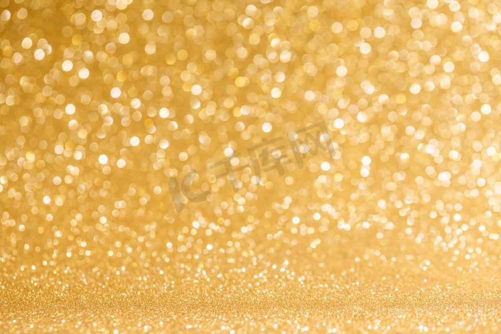 闪亮的金光背景。闪亮的金色波克闪光灯抽象背景，圣诞新年晚会庆祝概念图片
