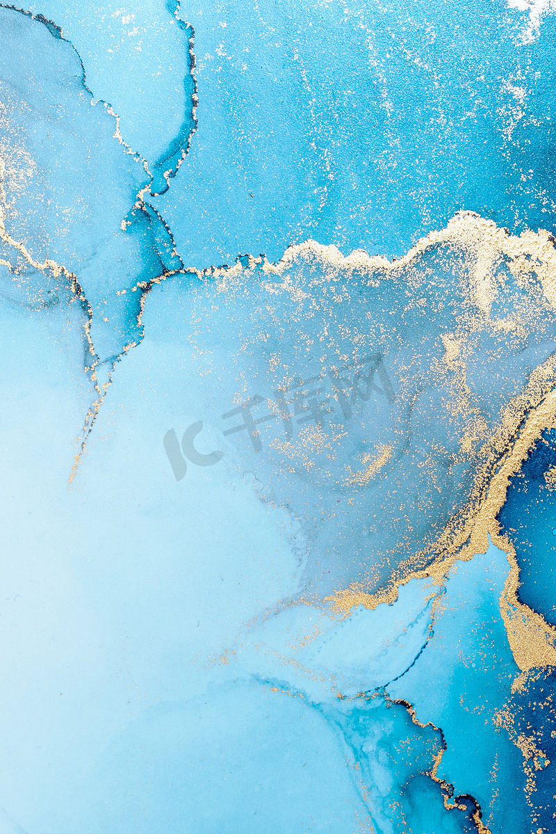 大理石液体水墨艺术画在纸上的豪华蓝色抽象背景。图片