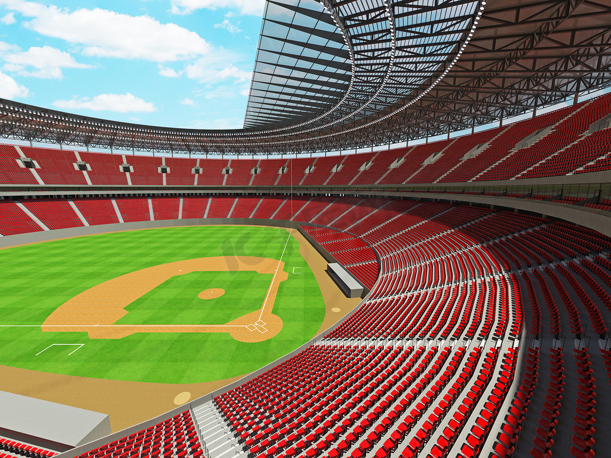 有红色座位和贵宾包厢的大型美丽的现代棒球场图片