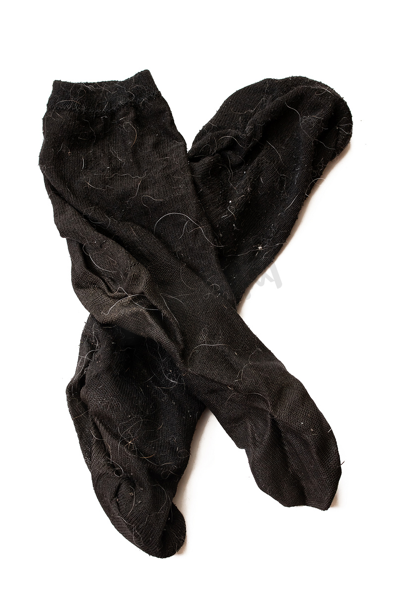 脏黑袜隔离在白色背景图片