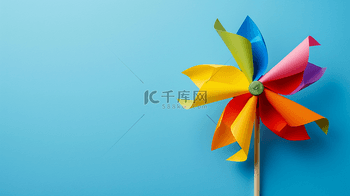 儿童节摄影图片图片素材六一儿童节卡通五颜六色纸风车背景图片