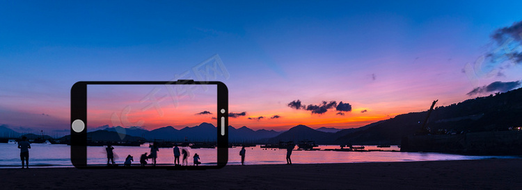 手机和夕阳海边风景背景