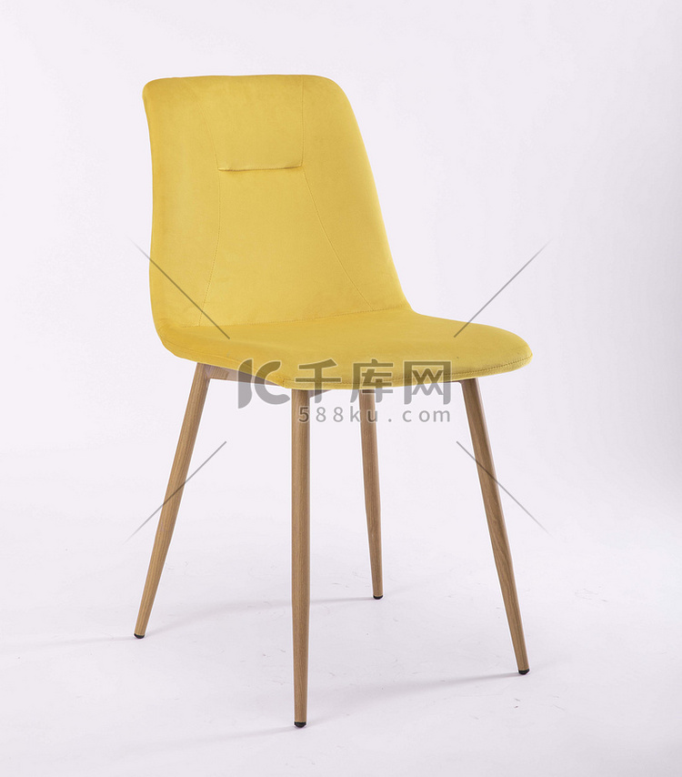 黄色北欧风椅子摄影图