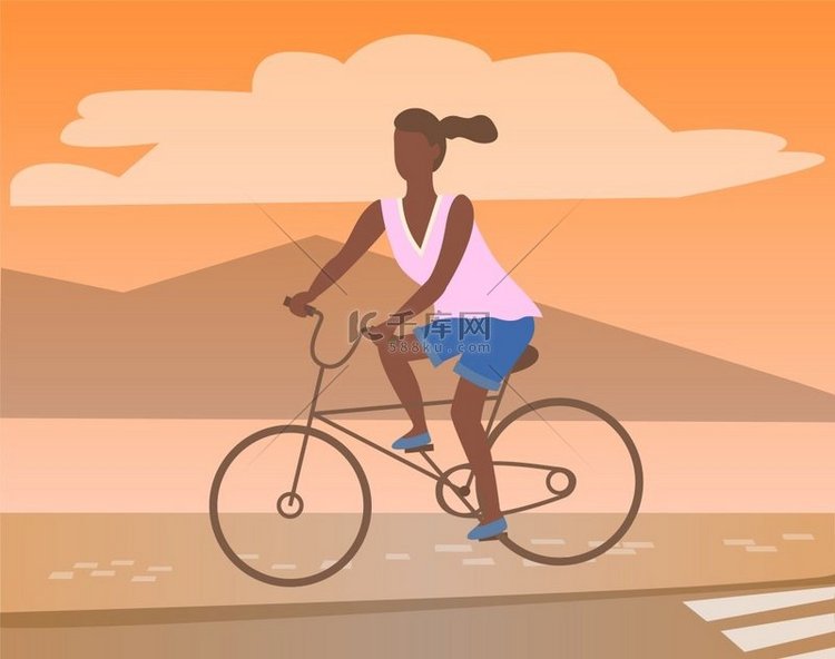 美国黑人妇女骑自行车，山景。