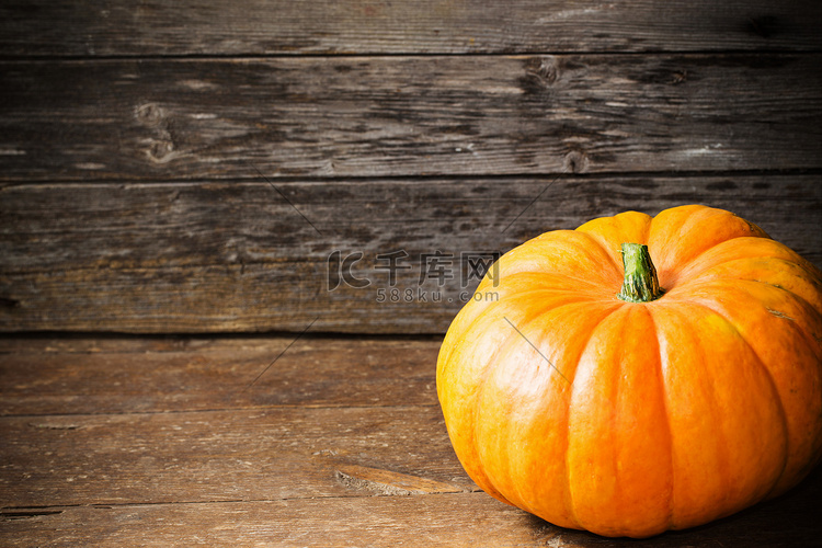 Pumpkin on wooden background