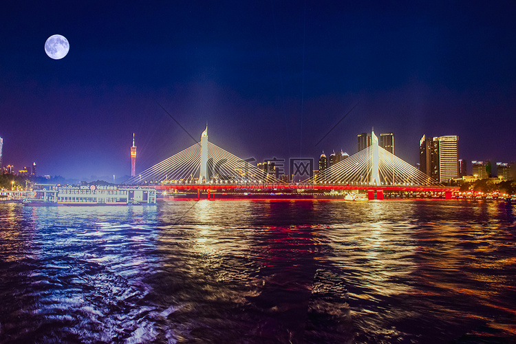 广州珠江海印桥上月亮高挂摄影图