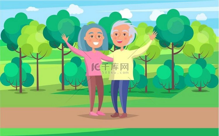 快乐的祖父母年长夫妇在公园里挥