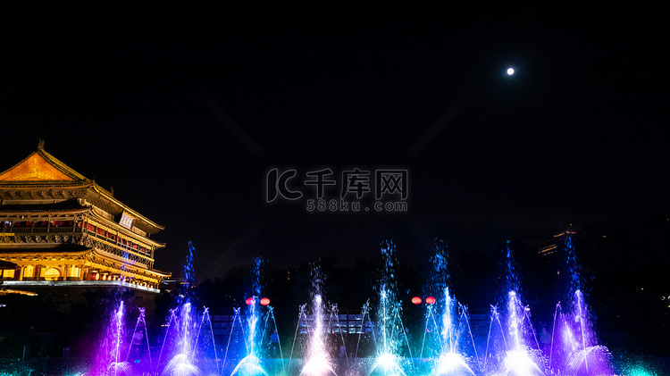 中秋夜晚鼓楼鼓楼广场喷泉摄影图