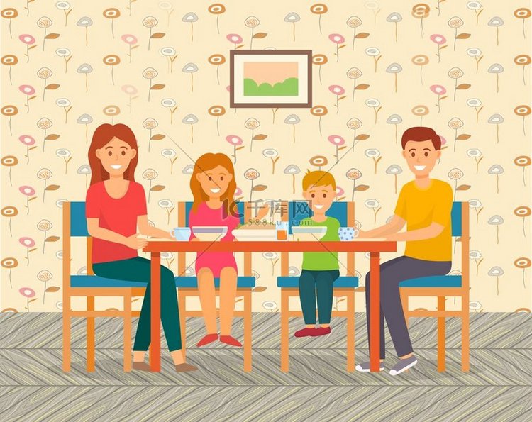 快乐的家庭坐在咖啡馆或家里的餐