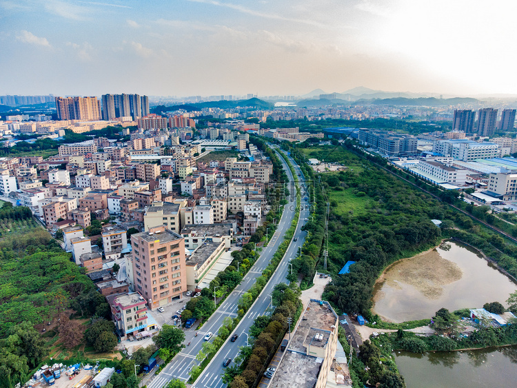 城市夕阳乡村道路空中航拍摄影图