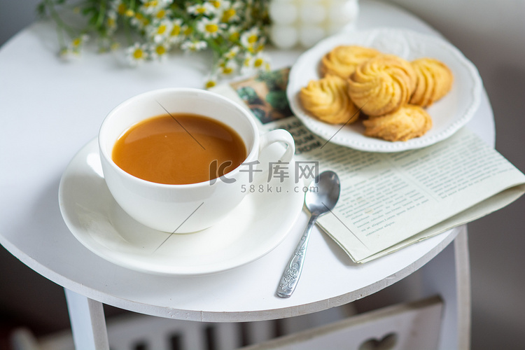 美食白天咖啡饼干桌子摆放摄影图