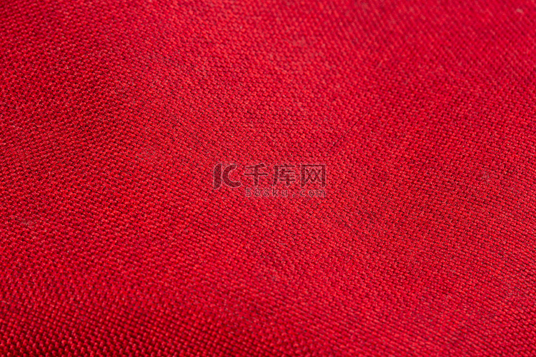 纺织品布料亚麻麻布橙红色摄影图