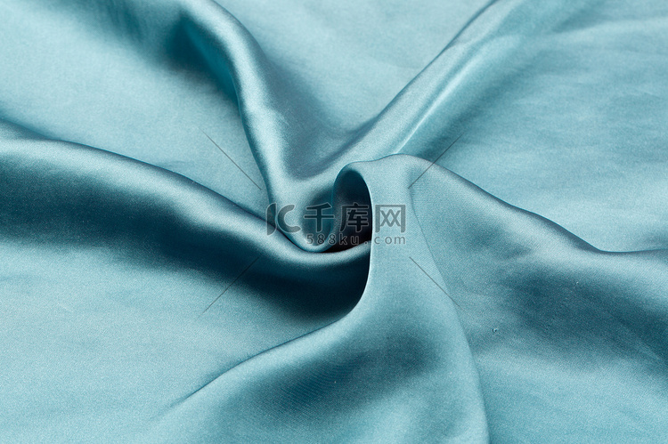 纺织品布料纹理褶皱绸缎蓝色摄影