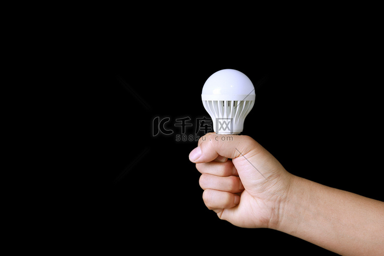 环保节能新能源灯泡低碳摄影图配