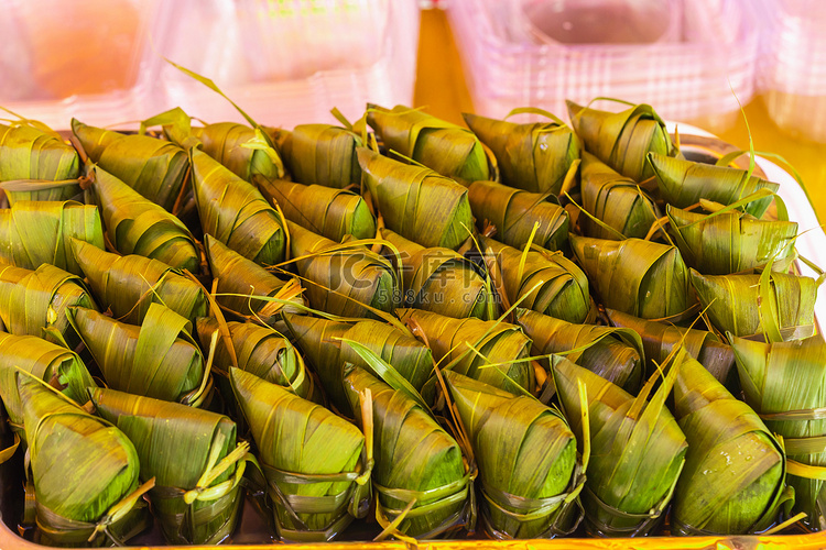 端午节早上粽子市场美食摄影图配
