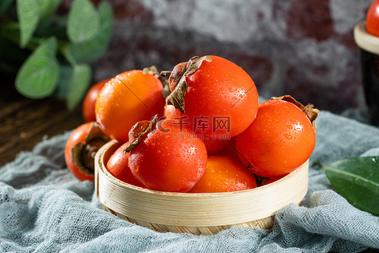 水果火罐柿子摄影图