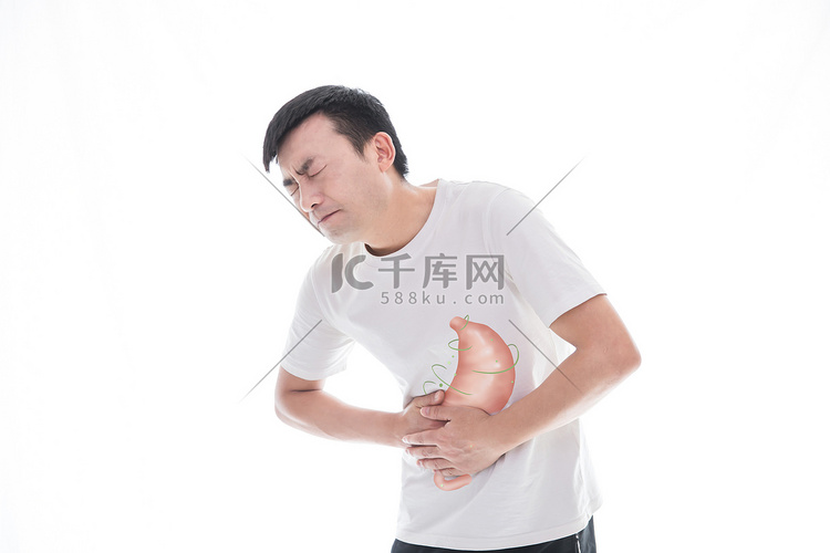 生病难受男性胃疼疼痛摄影图配图