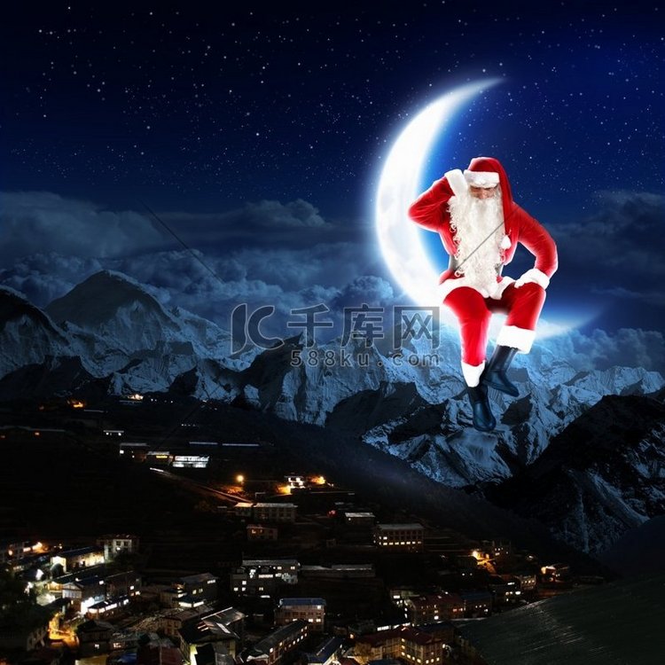 圣诞老人坐在月球上的照片。圣诞