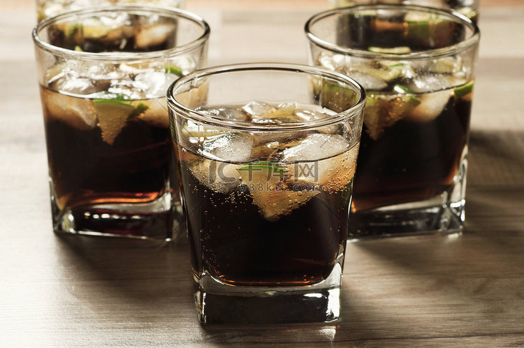 Cocktail with cola and ice