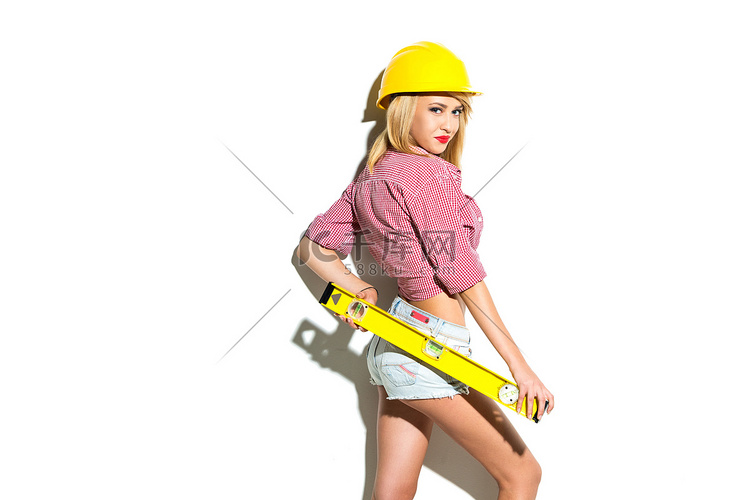 Concept for young sexy woman builder