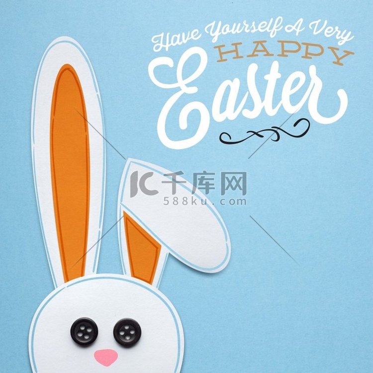 蓝底纸兔创意复活节概念图。