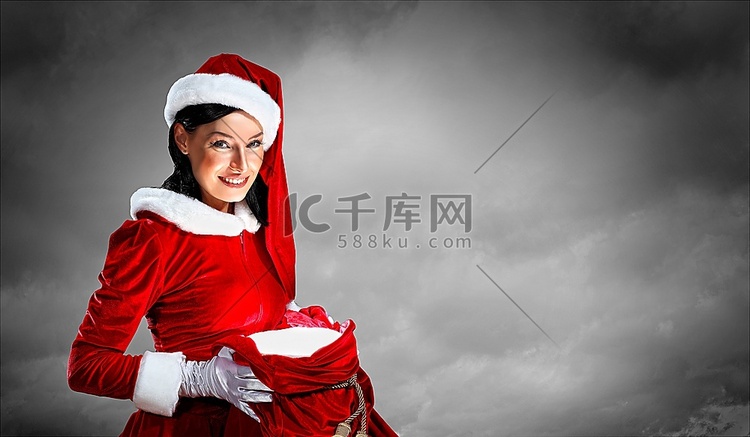 圣诞老人装扮的美丽女孩圣诞装饰