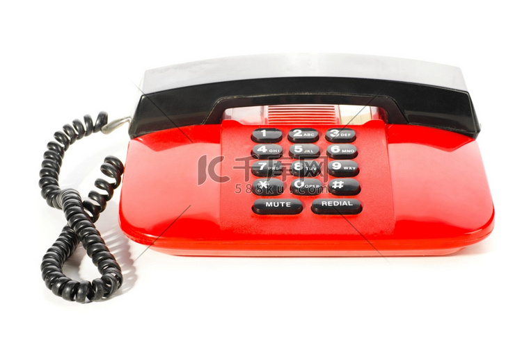 白色背景下隔离的红色桌面电话