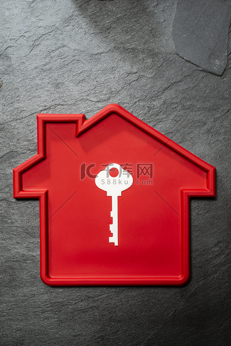 红色房屋形状和白键。