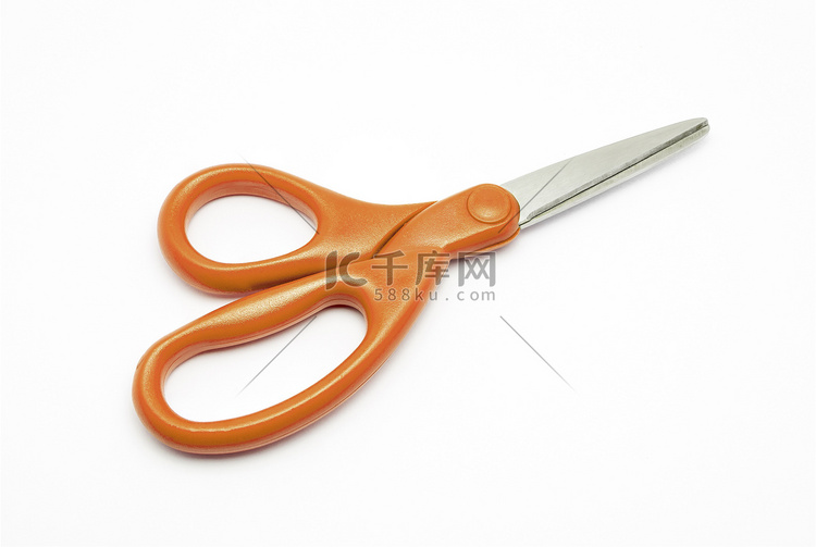 橙色塑料和不锈钢剪刀