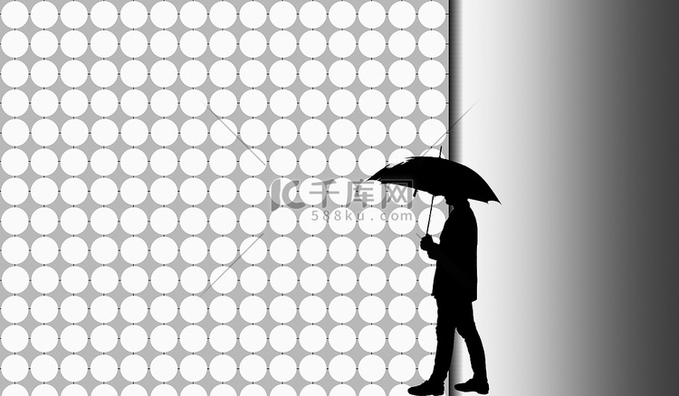 一个拿着雨伞的男人的轮廓在一个