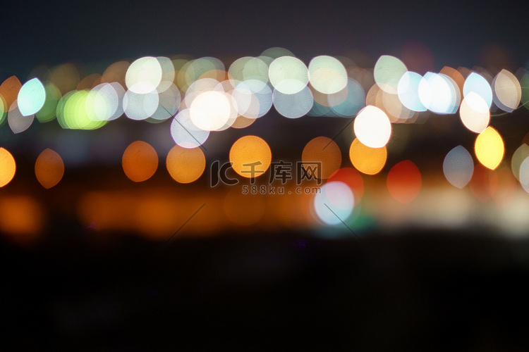 大城市的灯光离焦散景。