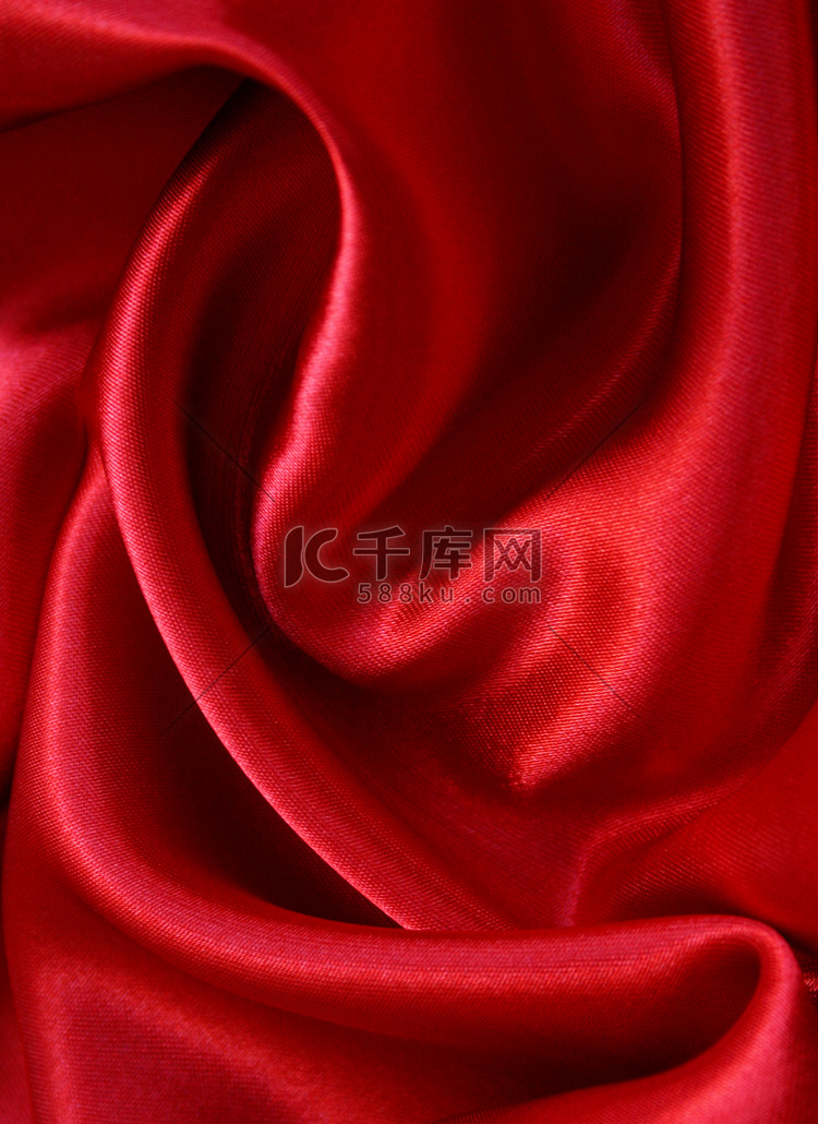 作为背景的光滑的红色丝绸