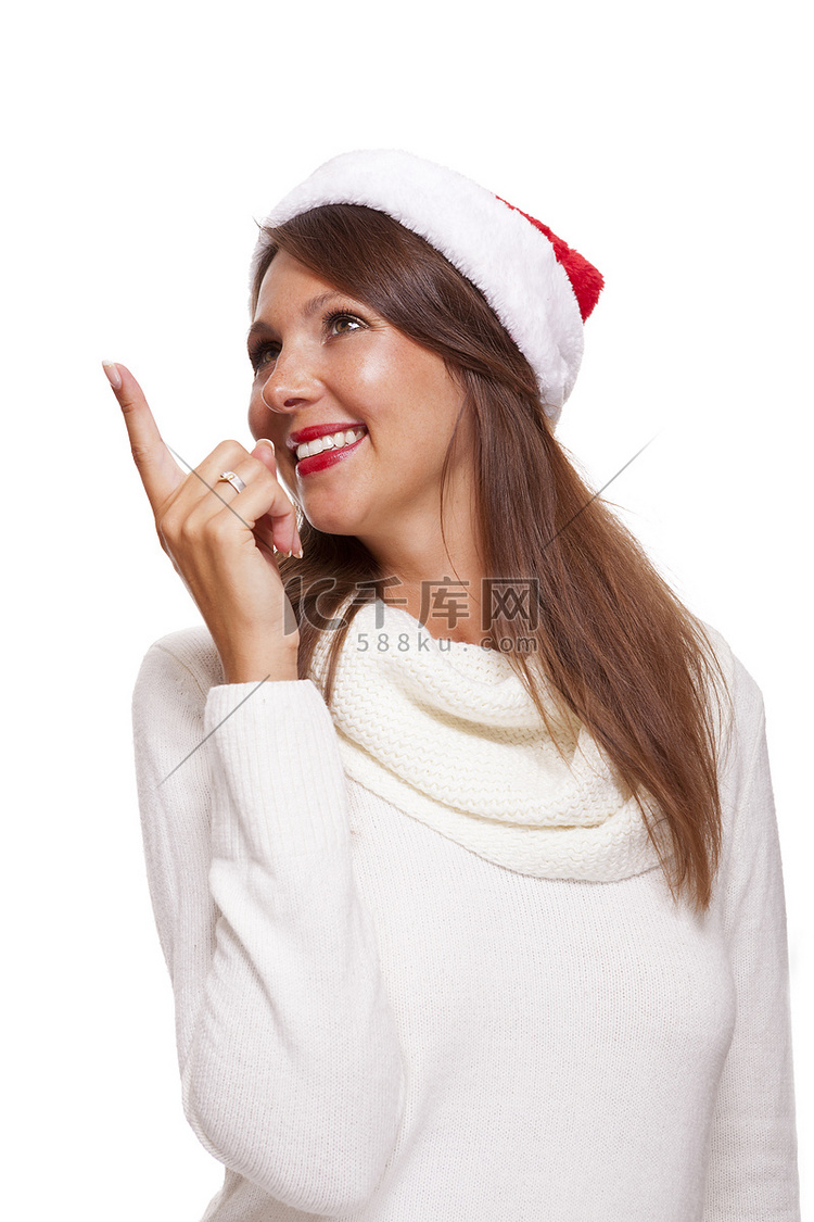 戴着圣诞帽的迷人微笑女人