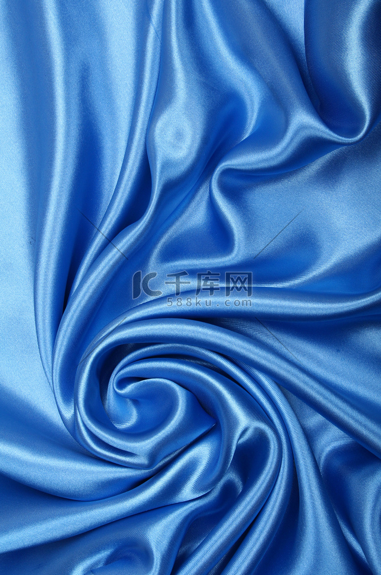 光滑优雅的蓝色丝绸可以用作背景