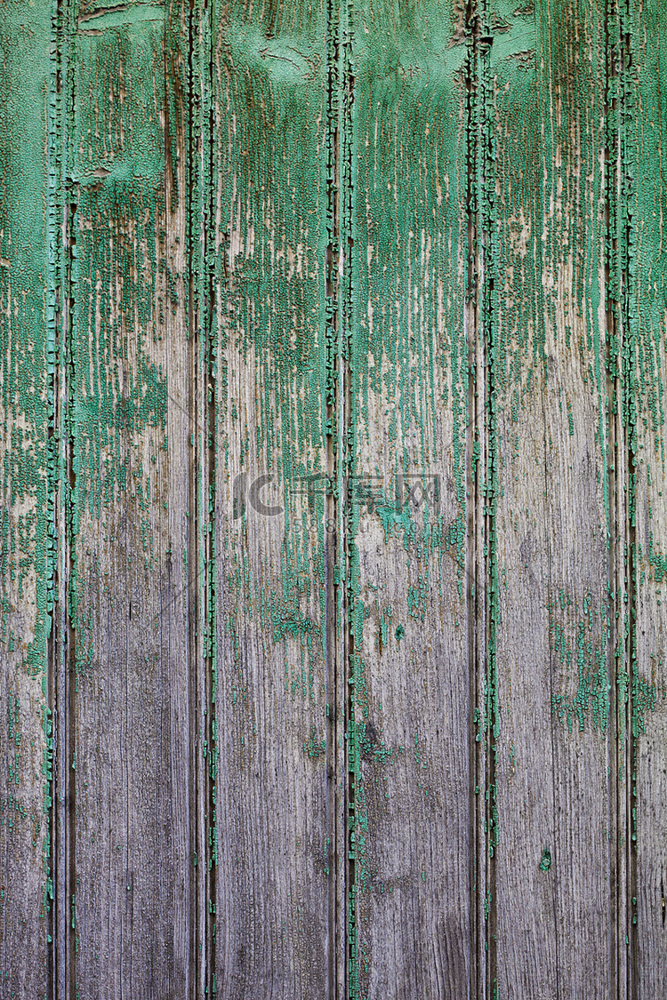 老木绿色门垃圾纹理。
