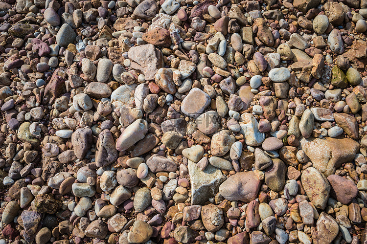 沙滩上砾石或卵石的图案背景