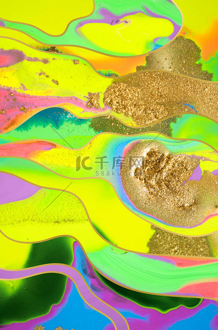 荧光油墨背景上的金粉和波浪。